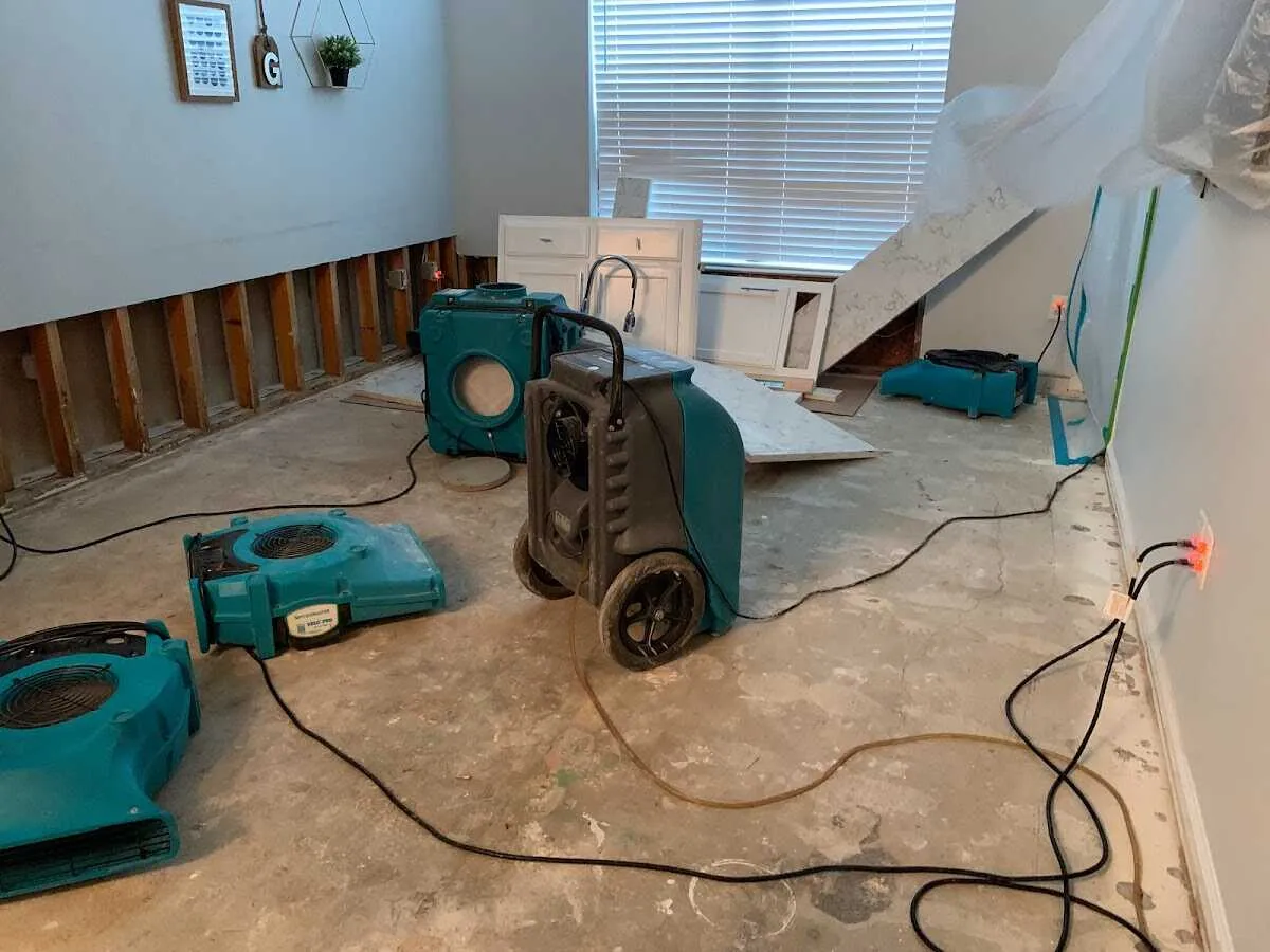 Dehumidifier in flood-cut room for Water Damage Restoration in Kent